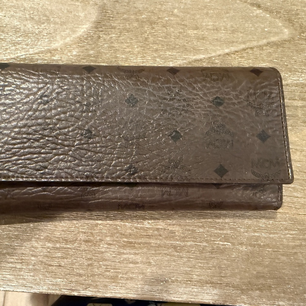 MCM Dark Brown Embossed Leather Wallet